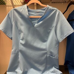 Jaanuu Light Blue Womens scrub set petite small bottom. Small top.